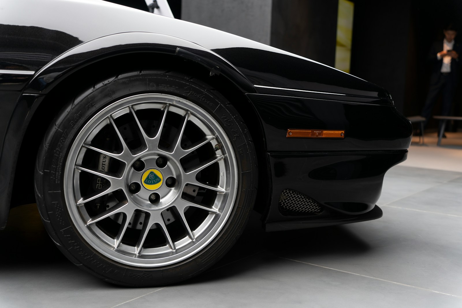 a black sports car parked in a garage