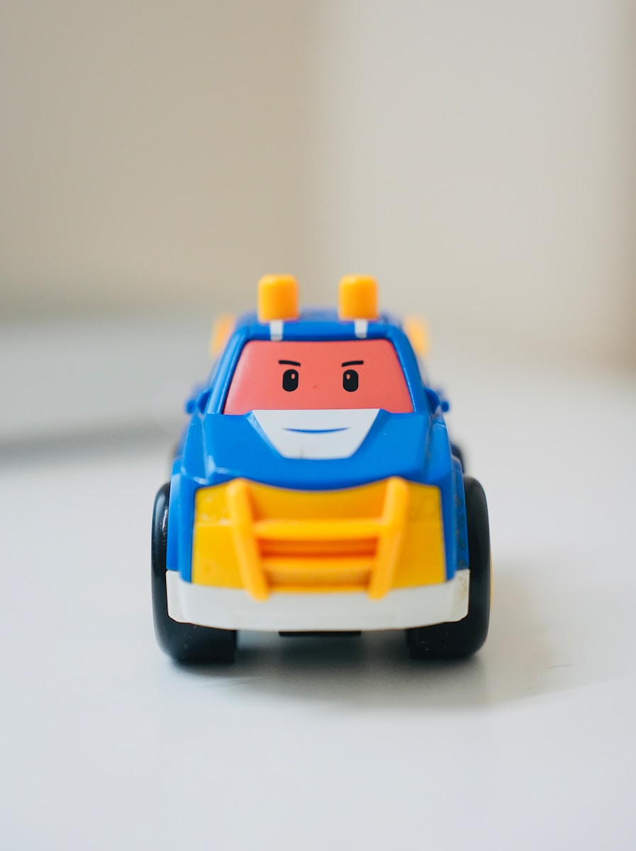 a toy car with a face